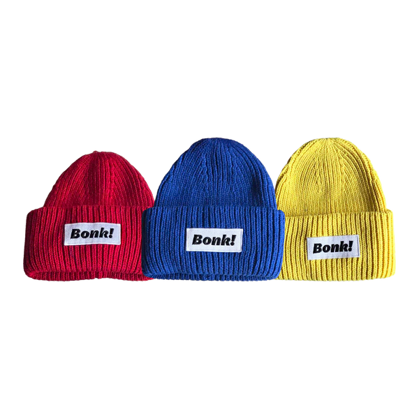 Bonk Beanie 3-Pack — red, blue and yellow beanies overlapping