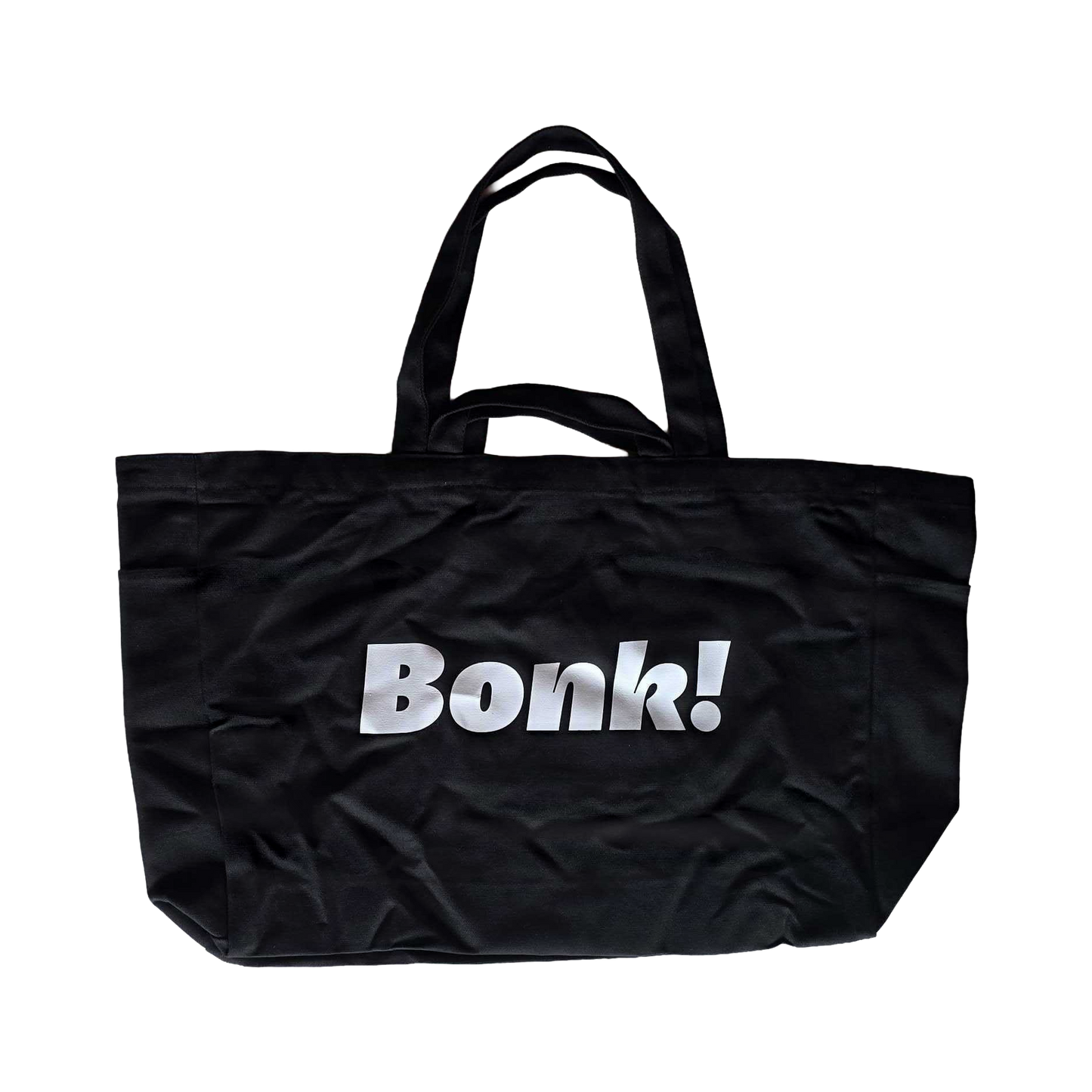 Bonk Canvas Tote in black, front, showing the white Bonk! logo