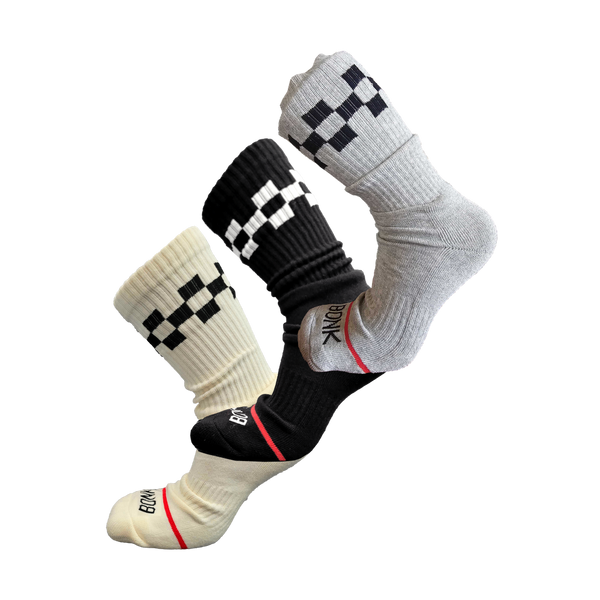 Bonk Mega Sock Bundle - three pairs of cushioned crew socks in Cream, Black and Grey, stacked on a diagonal